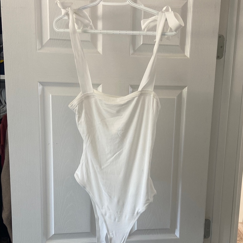 White feminine bodysuit